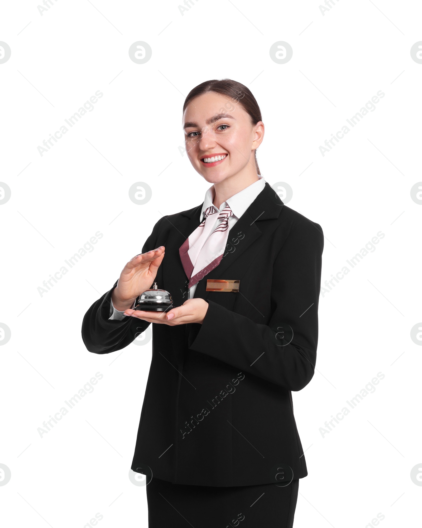 Photo of Smiling receptionist in uniform holding service bell on white background