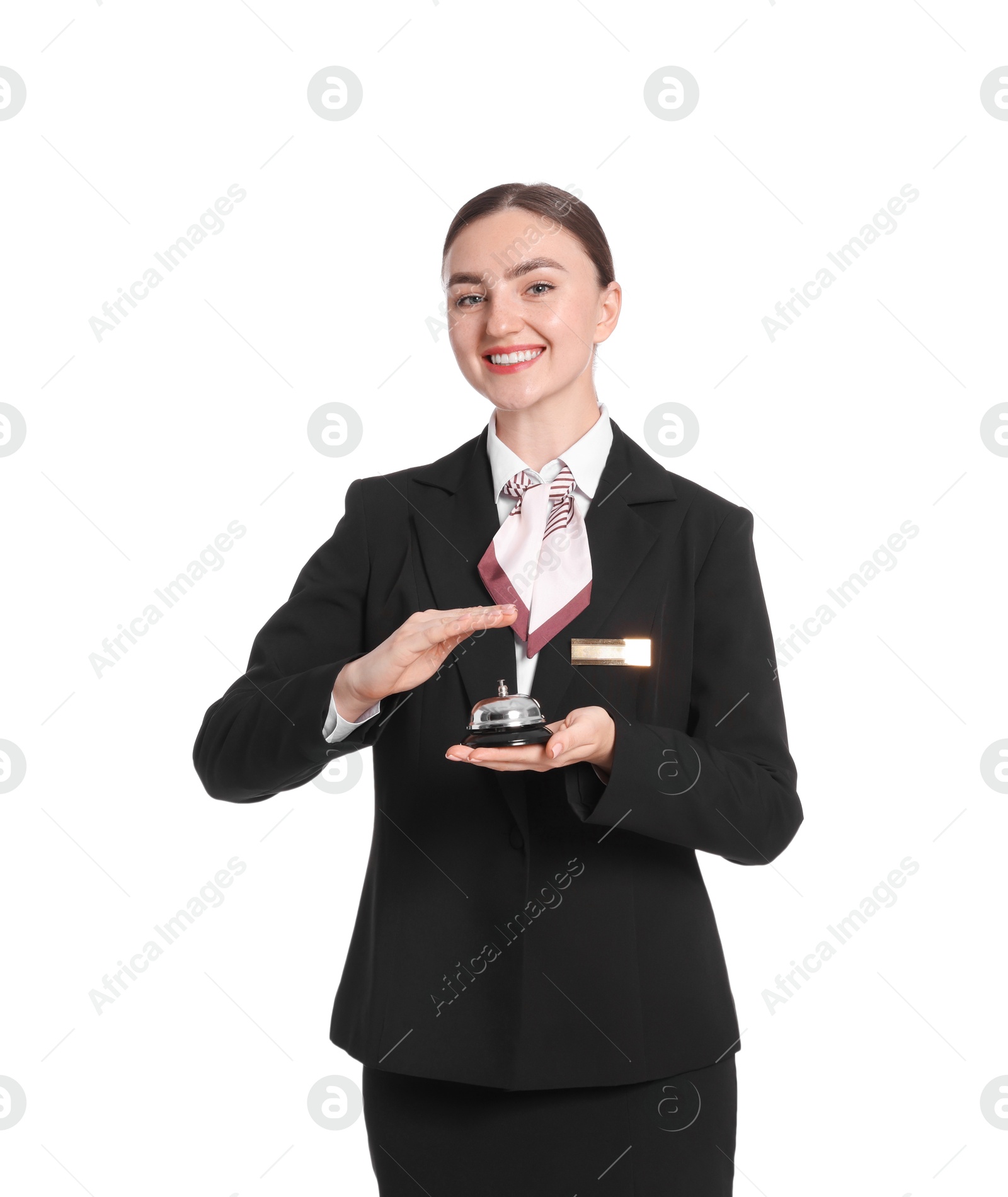 Photo of Smiling receptionist in uniform holding service bell on white background