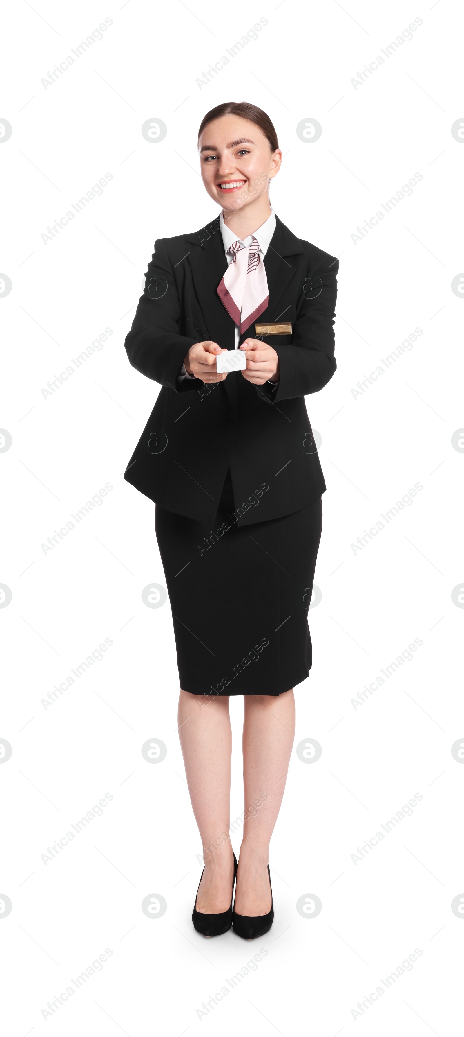 Smiling receptionist in uniform giving hotel key card on white background Photo of Smiling receptionist in uniform giving hotel key card on white background