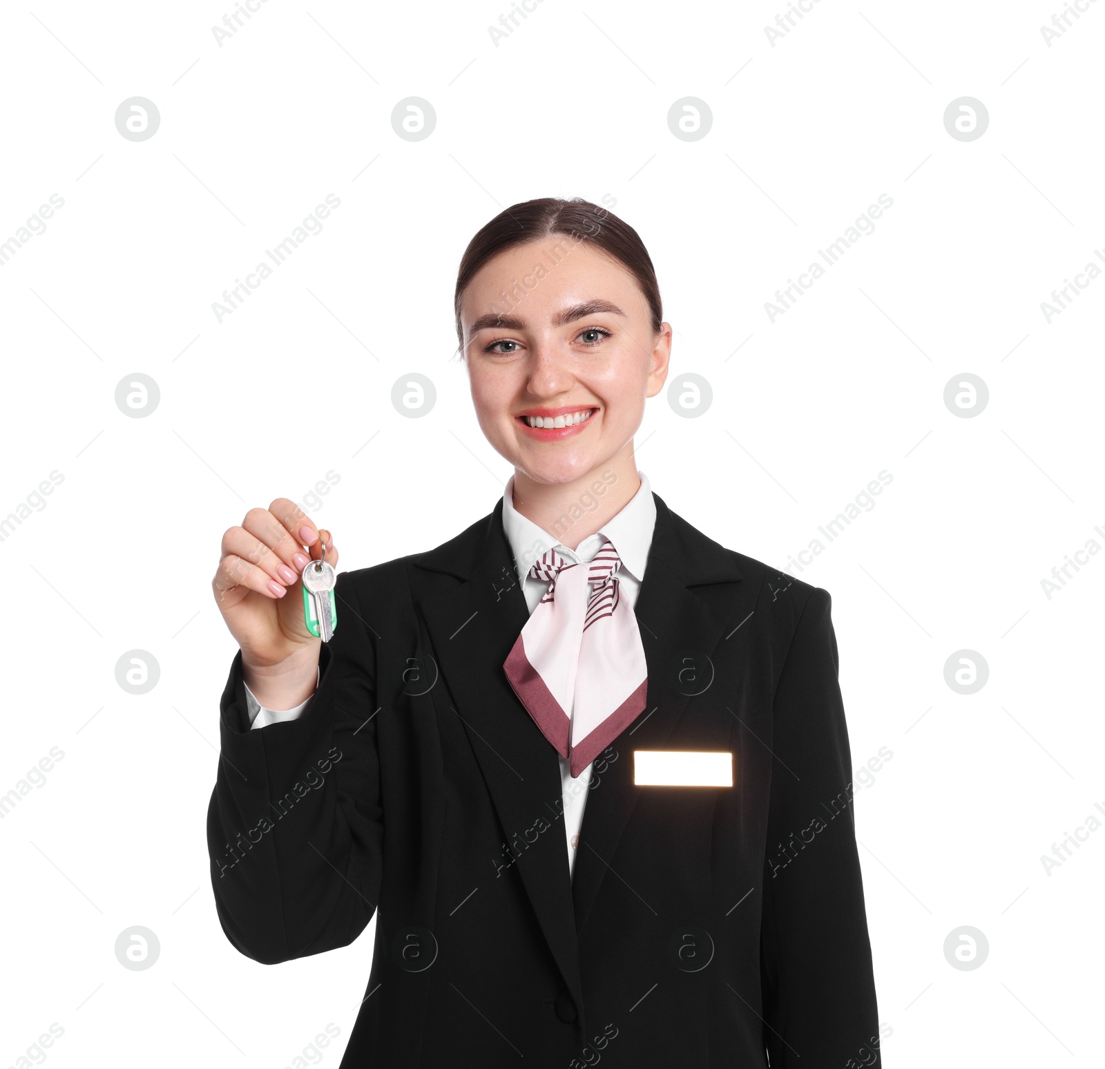 Smiling receptionist in uniform with guest room key on white background Photo of Smiling receptionist in uniform with guest room key on white background