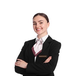 Photo of Smiling receptionist in uniform with crossed arms on white background