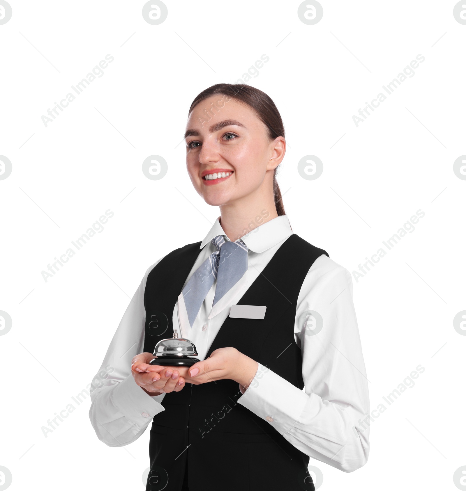 Photo of Smiling receptionist in uniform holding service bell on white background