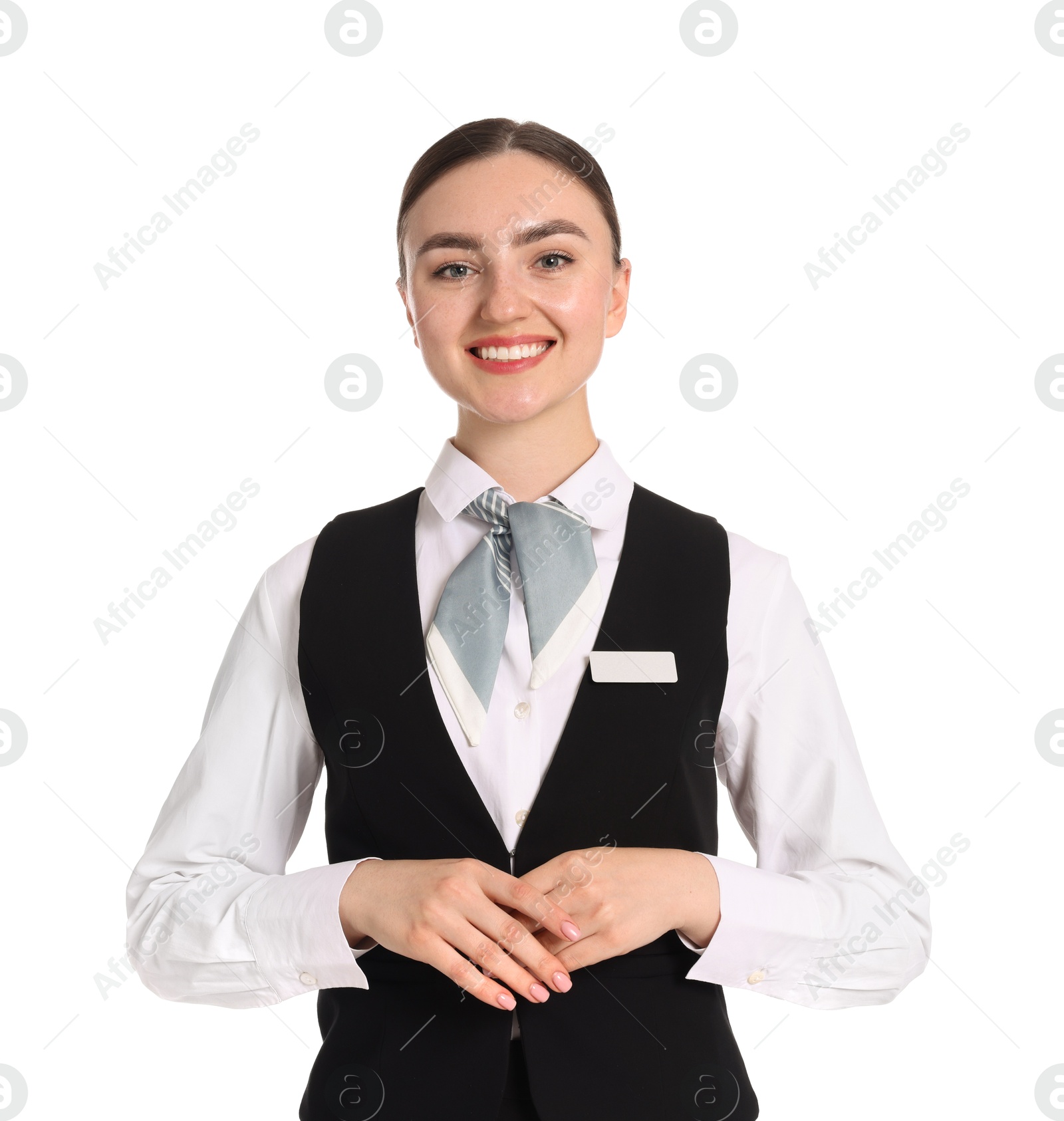 Smiling receptionist in uniform on white background Photo of Smiling receptionist in uniform on white background