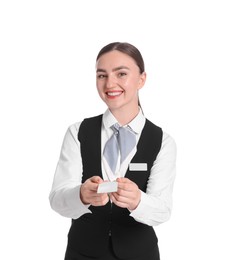 Photo of Smiling receptionist in uniform giving hotel key card on white background