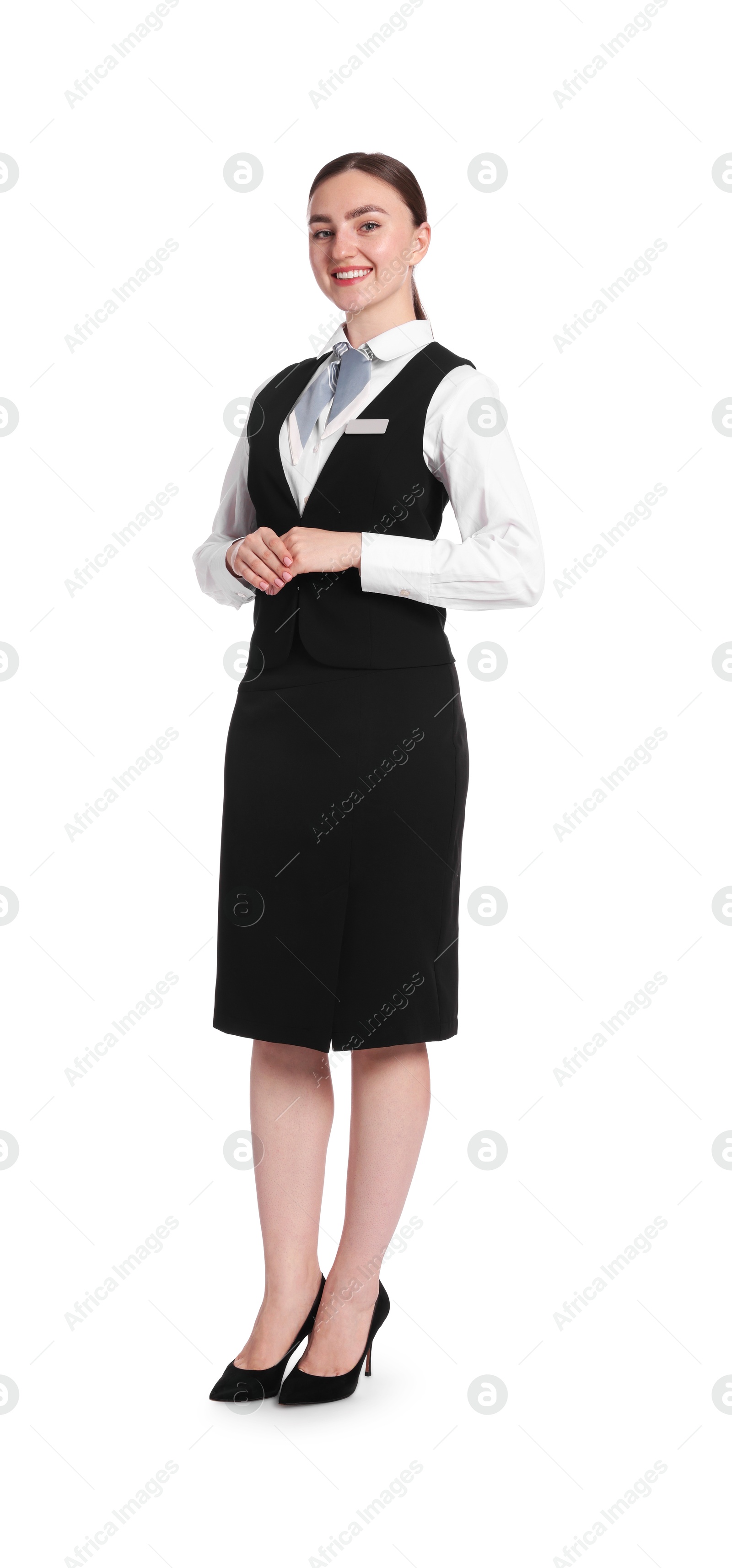 Smiling receptionist in uniform on white background Photo of Smiling receptionist in uniform on white background