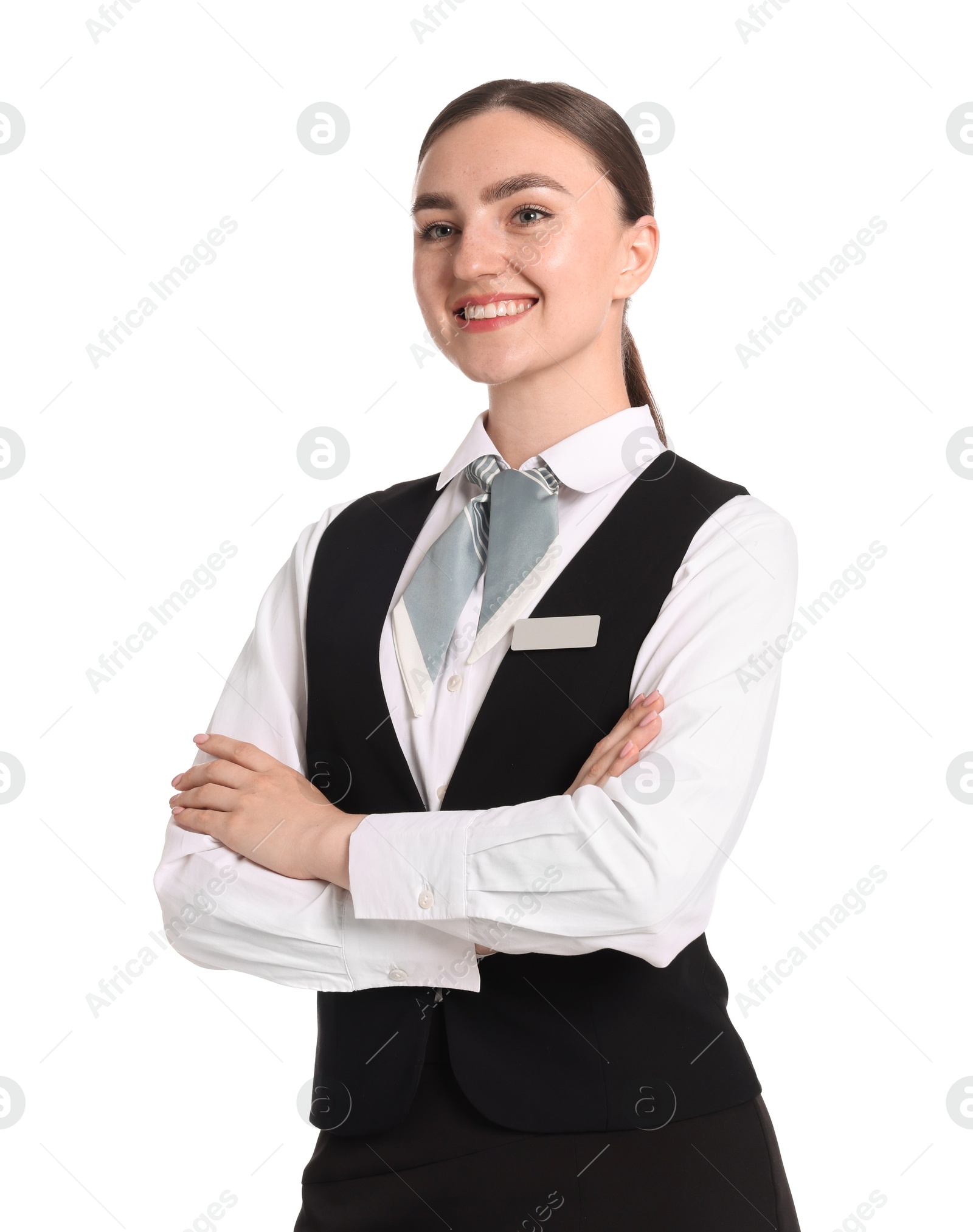 Smiling receptionist in uniform with crossed arms on white background Photo of Smiling receptionist in uniform with crossed arms on white background