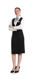 Photo of Smiling receptionist in uniform with crossed arms on white background