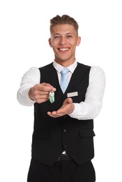 Photo of Smiling receptionist in uniform with guest room key on white background