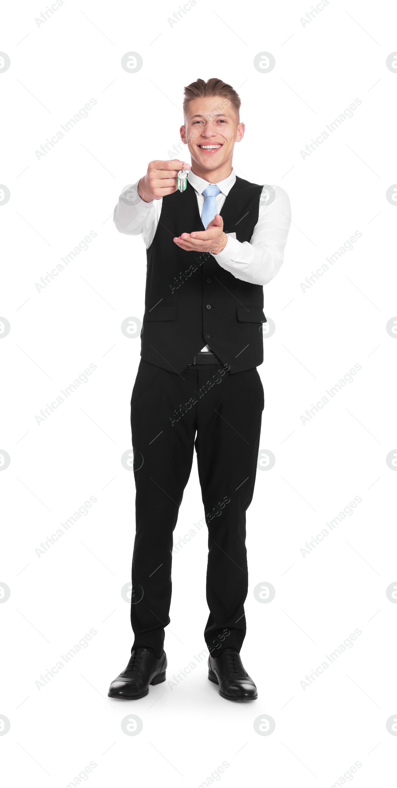 Smiling receptionist in uniform with guest room key on white background Photo of Smiling receptionist in uniform with guest room key on white background