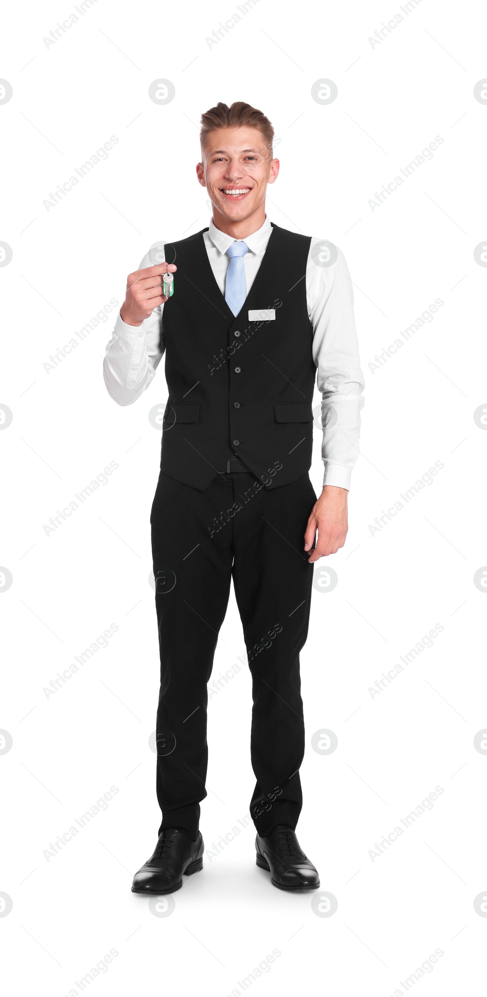 Smiling receptionist in uniform with guest room key on white background Photo of Smiling receptionist in uniform with guest room key on white background