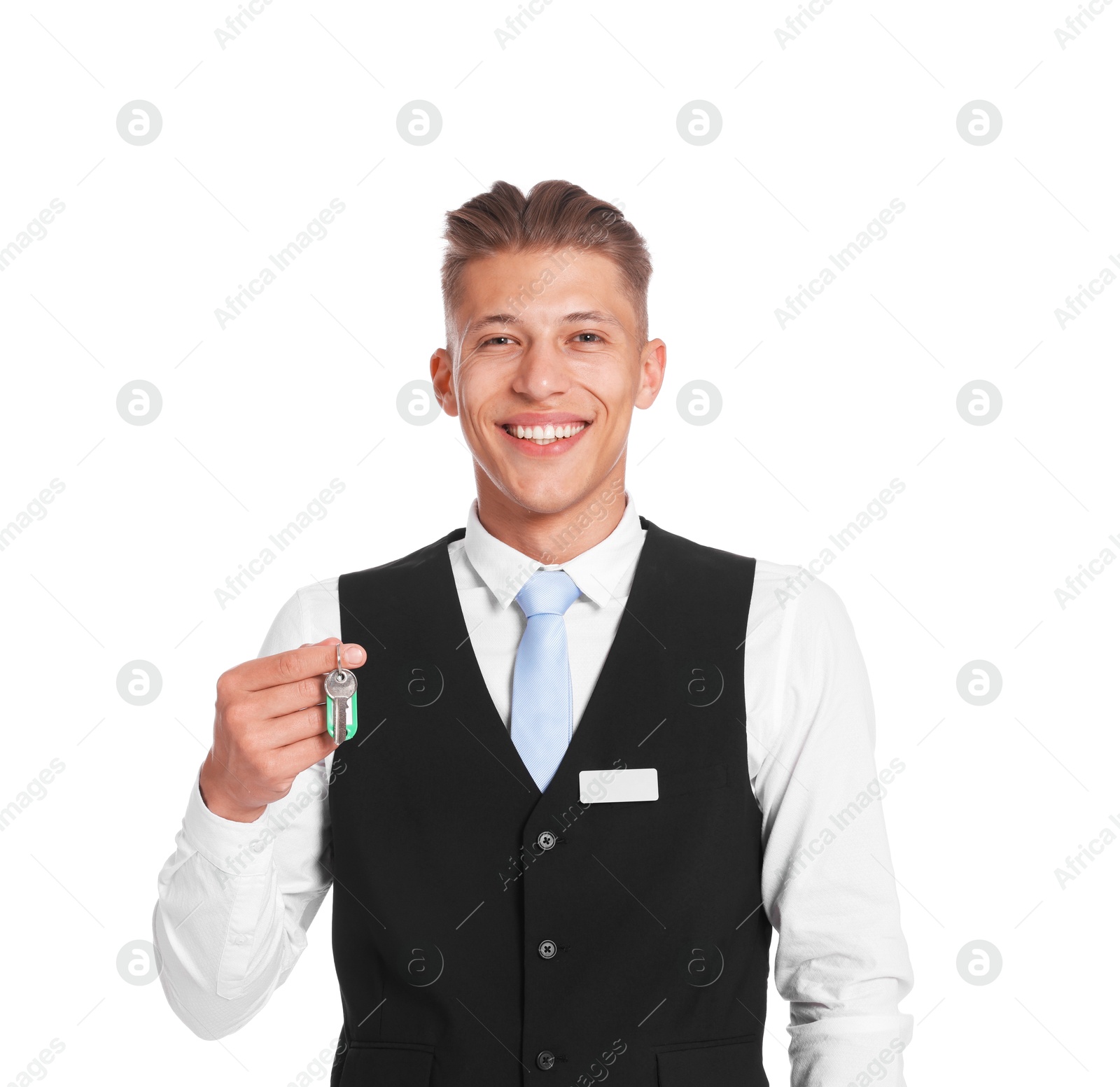 Smiling receptionist in uniform with guest room key on white background Photo of Smiling receptionist in uniform with guest room key on white background