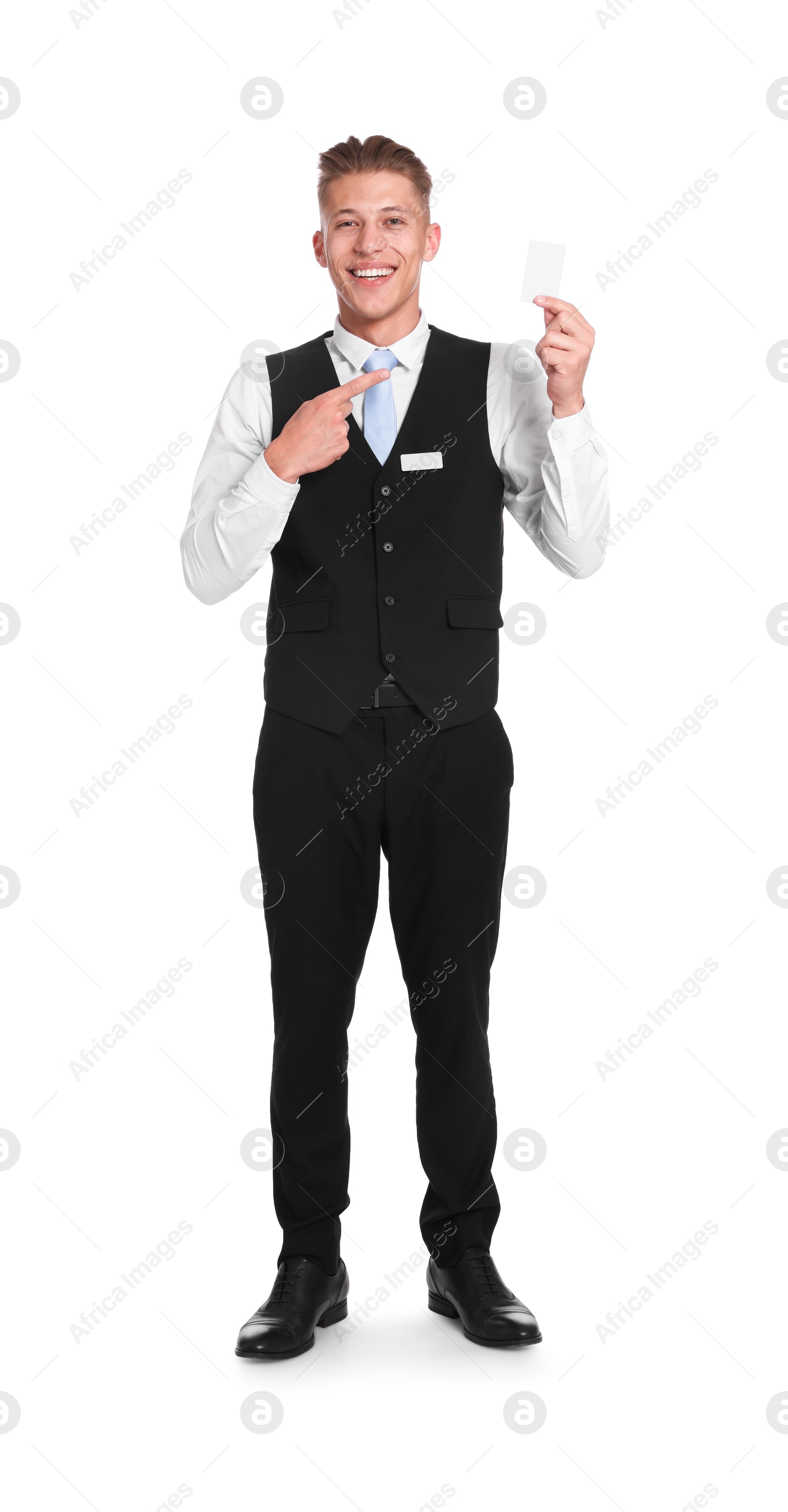 Smiling receptionist in uniform pointing at hotel key card on white background Photo of Smiling receptionist in uniform pointing at hotel key card on white background