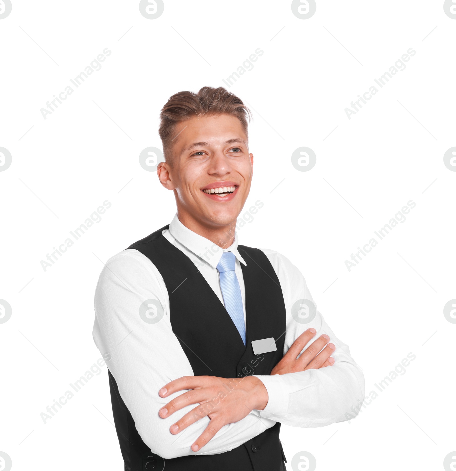 Smiling receptionist in uniform with crossed arms on white background Photo of Smiling receptionist in uniform with crossed arms on white background