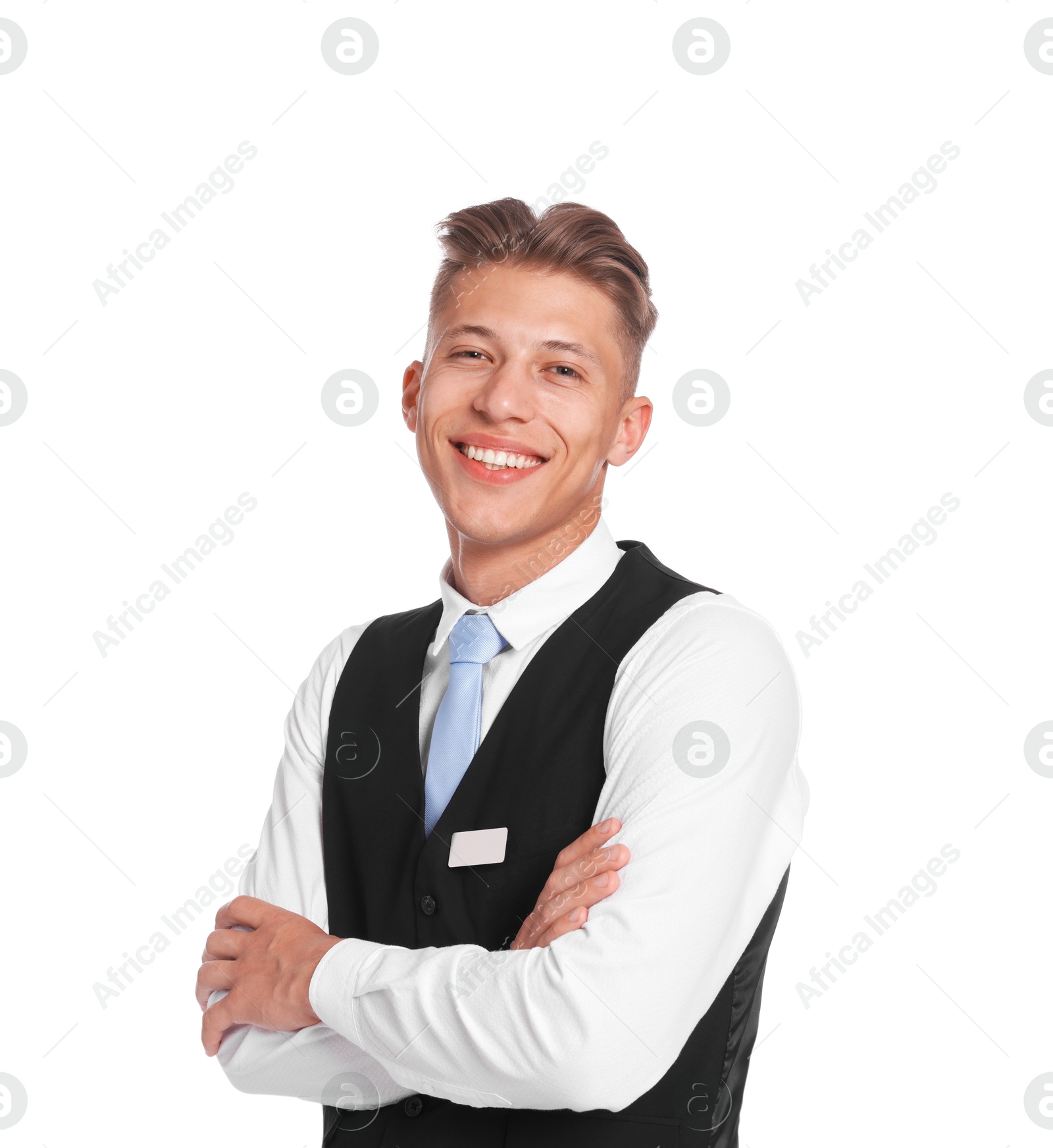 Smiling receptionist in uniform with crossed arms on white background Photo of Smiling receptionist in uniform with crossed arms on white background