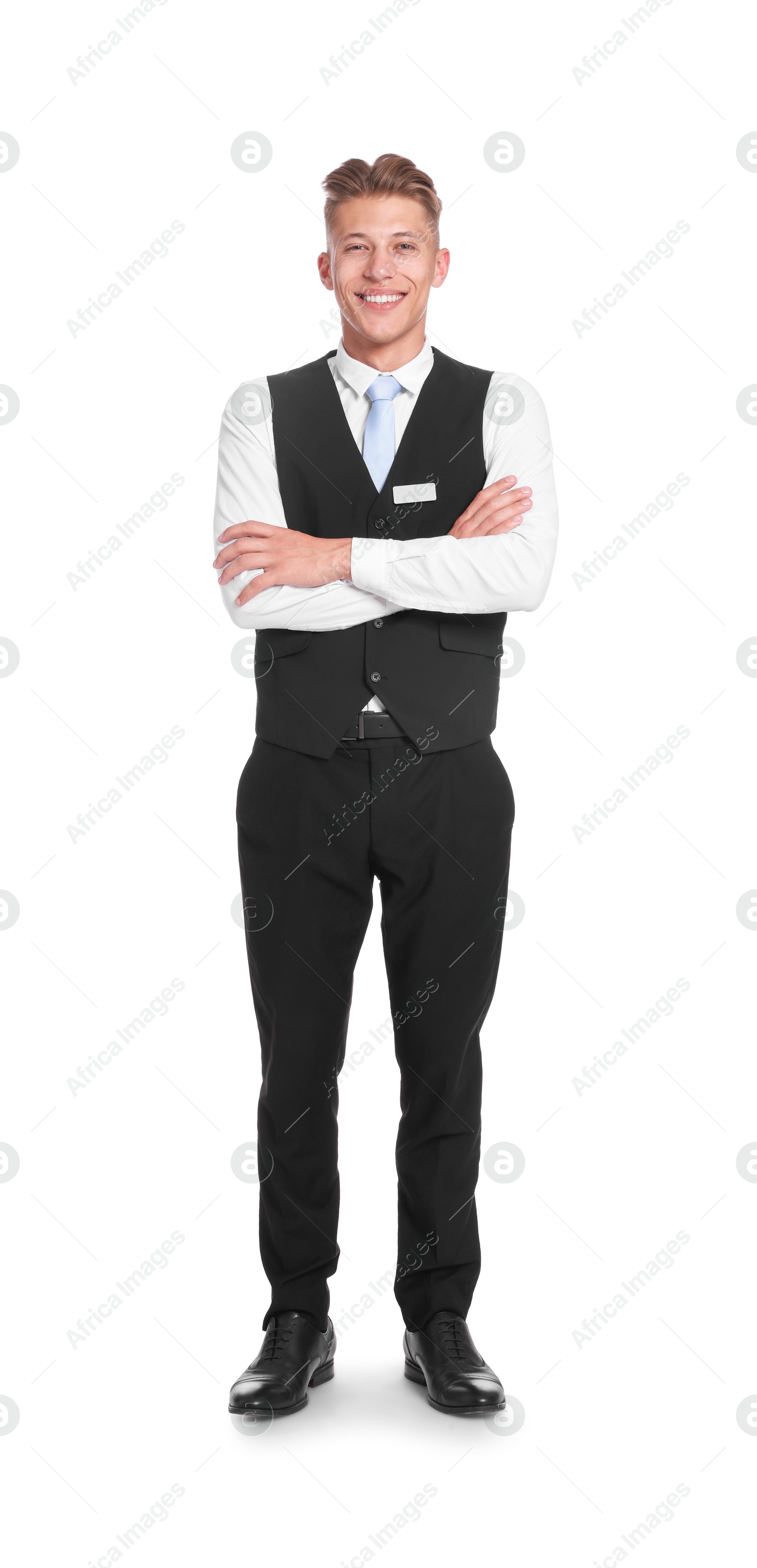 Smiling receptionist in uniform with crossed arms on white background Photo of Smiling receptionist in uniform with crossed arms on white background