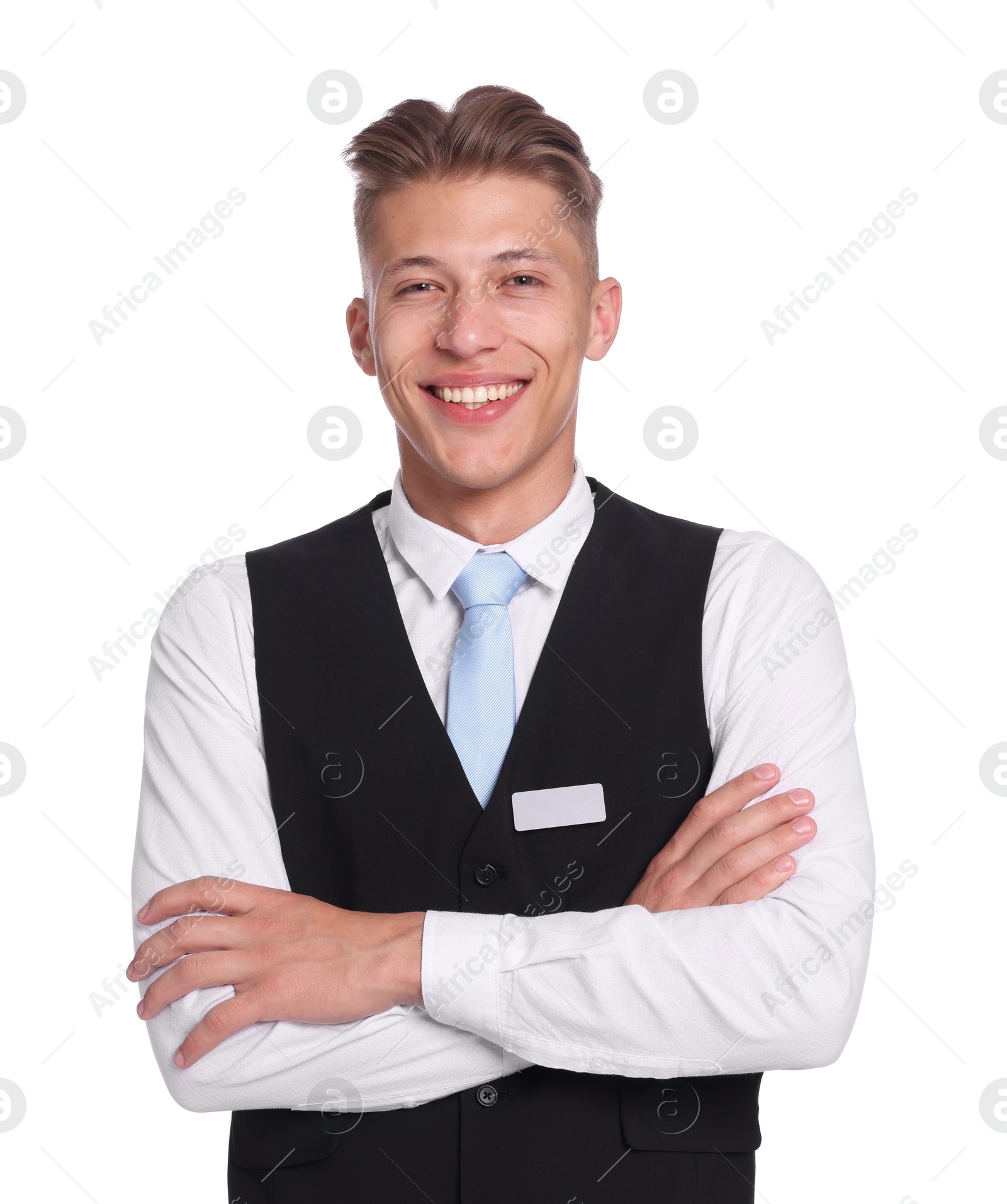 Smiling receptionist in uniform with crossed arms on white background Photo of Smiling receptionist in uniform with crossed arms on white background