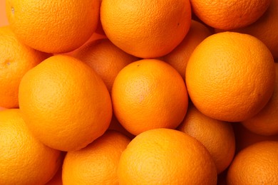 Photo of Fresh ripe oranges as background, top view