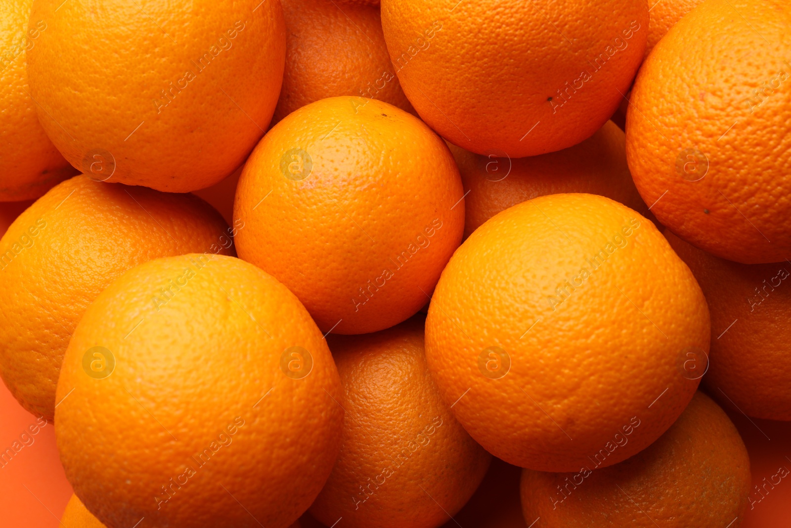 Photo of Fresh ripe oranges as background, top view