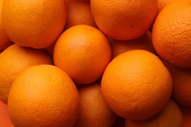 Photo of Fresh ripe oranges as background, top view