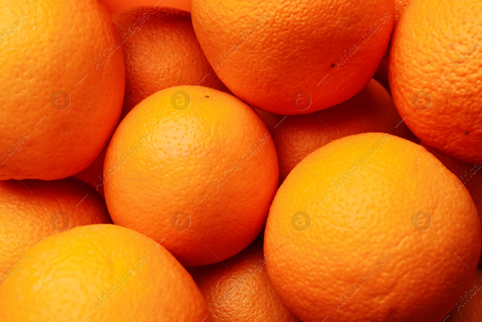 Photo of Fresh ripe oranges as background, top view
