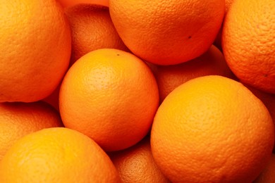 Photo of Fresh ripe oranges as background, top view