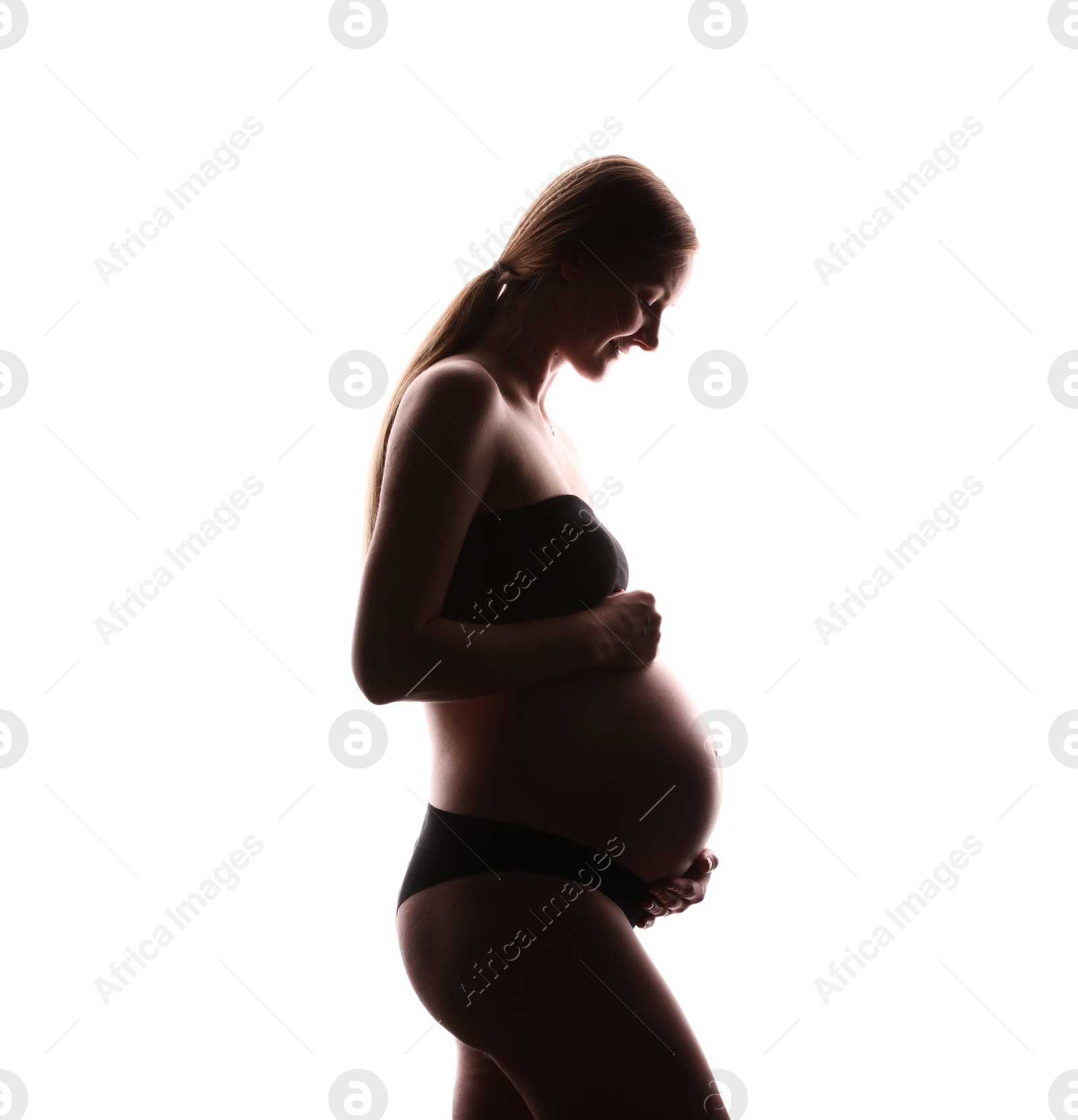 Silhouette of pregnant woman on white background Photo of Silhouette of pregnant woman on white background