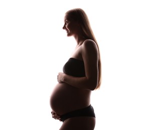 Photo of Silhouette of pregnant woman on white background