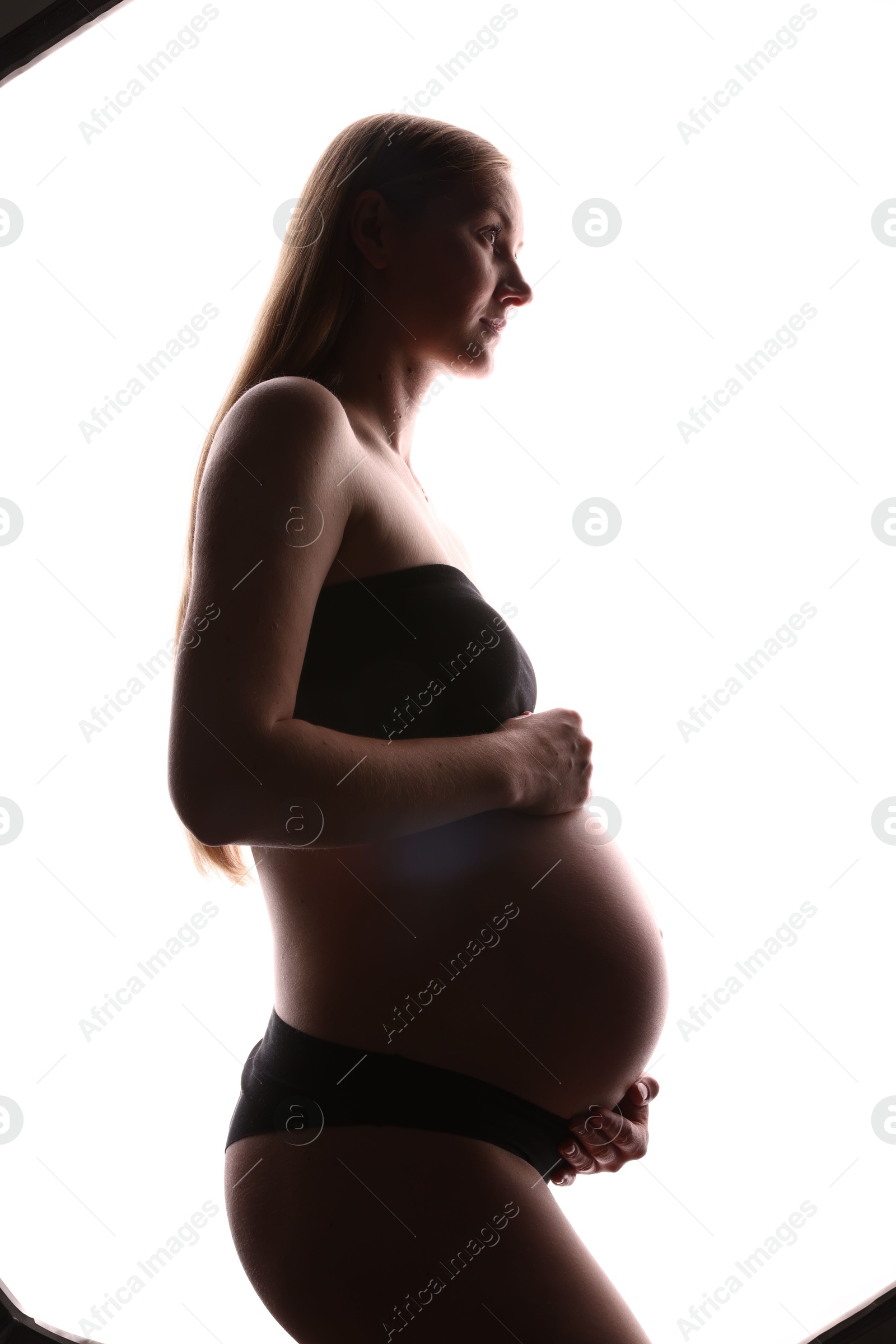 Silhouette of pregnant woman on white background Photo of Silhouette of pregnant woman on white background