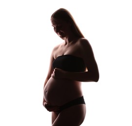 Photo of Silhouette of pregnant woman on white background