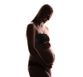 Photo of Silhouette of pregnant woman on white background
