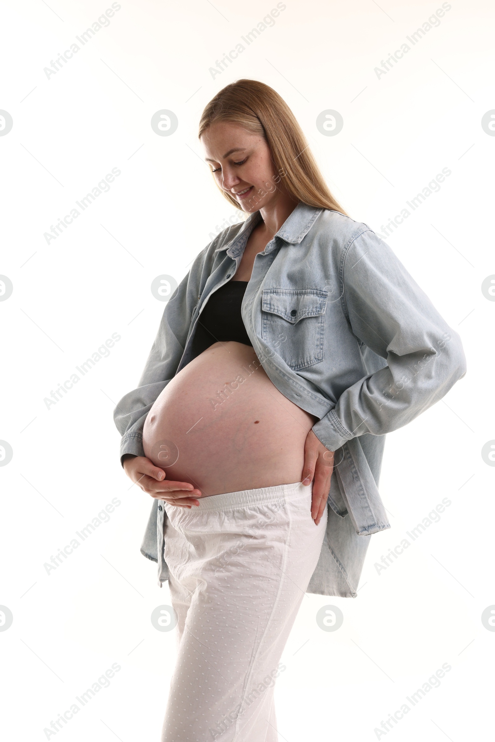 Portrait of beautiful pregnant woman on white background Photo of Portrait of beautiful pregnant woman on white background