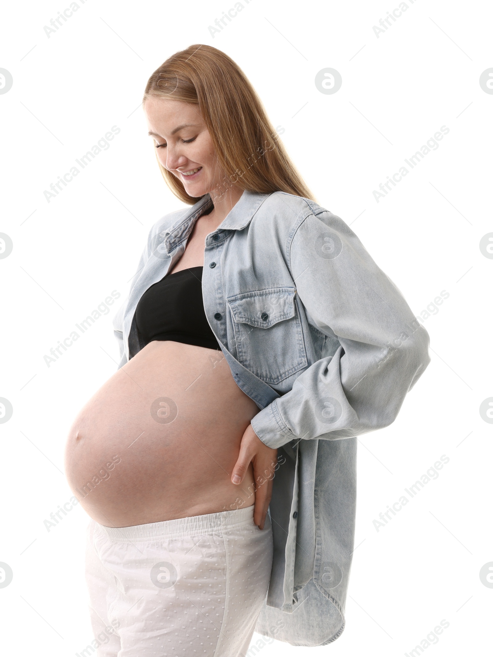 Portrait of beautiful pregnant woman on white background Photo of Portrait of beautiful pregnant woman on white background