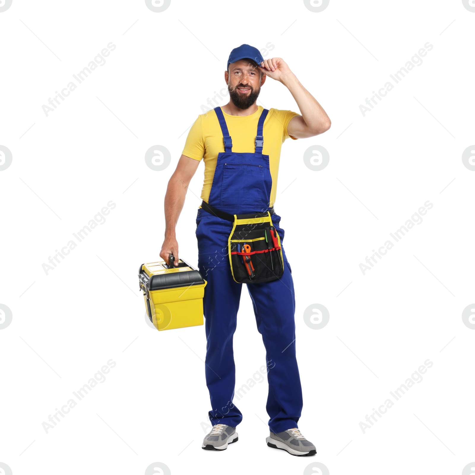 Professional repairman with tool box on white background Photo of Professional repairman with tool box on white background