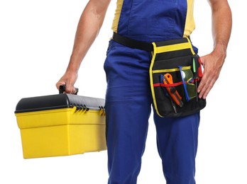Photo of Professional repairman with tool box on white background, closeup