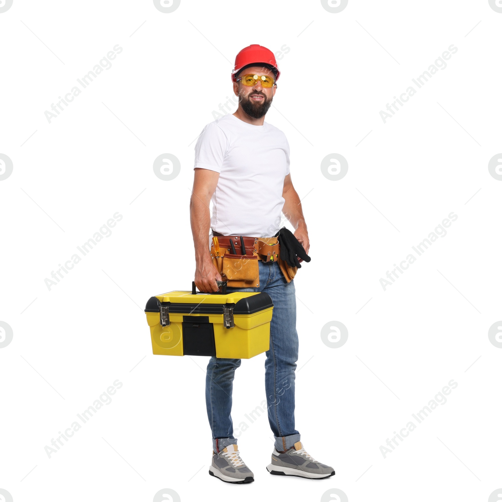Professional repairman with tool box on white background Photo of Professional repairman with tool box on white background