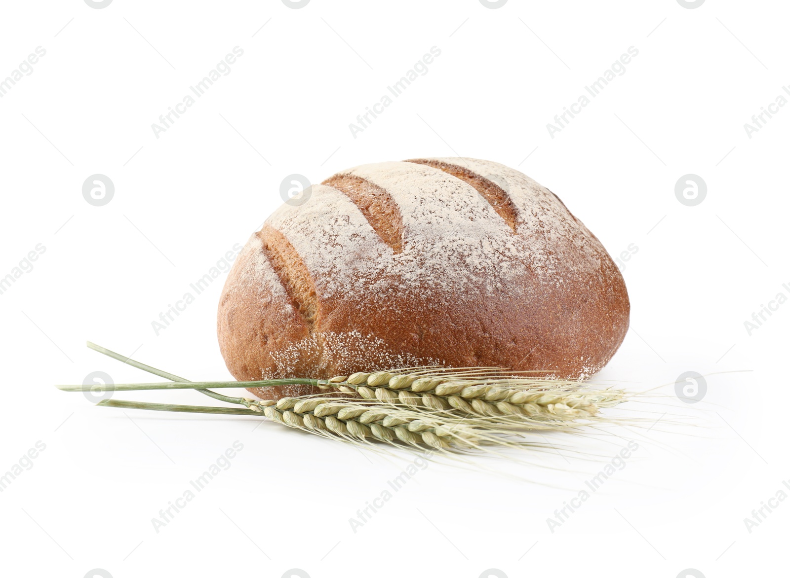Photo of Fresh bread and green wheat spikes isolated on white