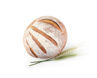 Photo of Fresh bread and green wheat spikes isolated on white, top view