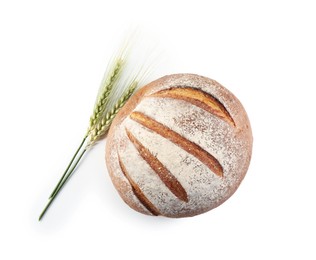 Photo of Fresh bread and green wheat spikes isolated on white, top view