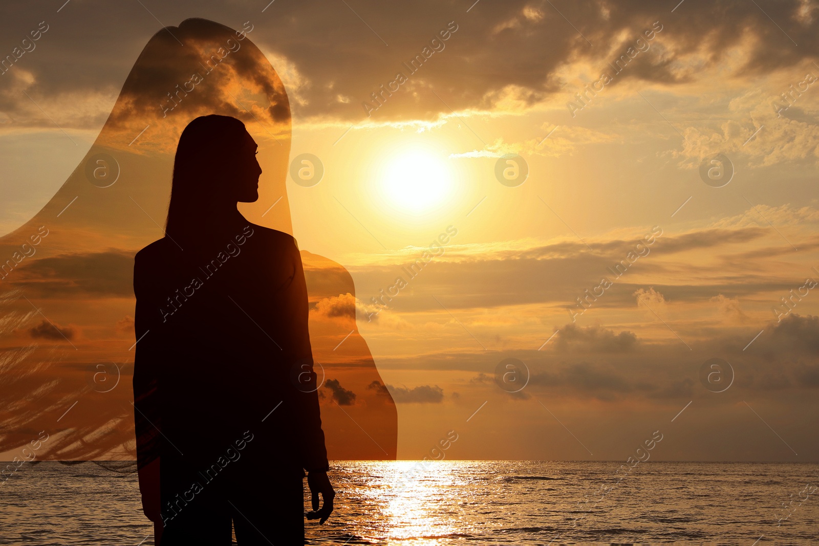 Hope. Silhouettes of woman near sea at sunset, double exposure Image of Hope. Silhouettes of woman near sea at sunset, double exposure