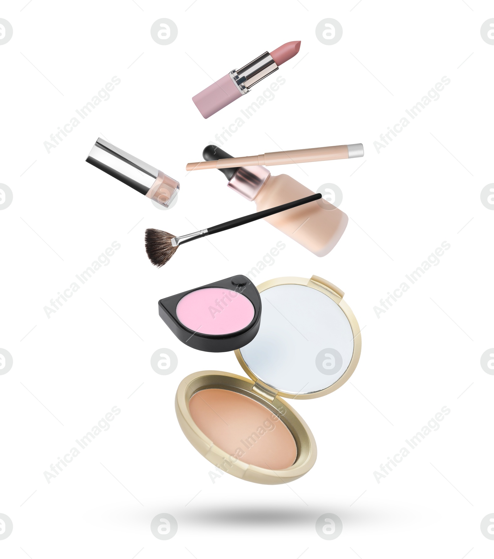 Image of Different makeup products in air against white background