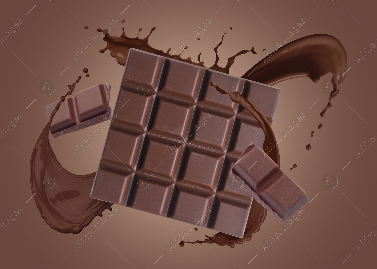 Chocolate pieces and cacao drink splash on brown background Image of Chocolate pieces and cacao drink splash on brown background