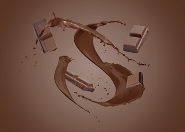 Image of Chocolate pieces and cacao drink splash on brown background