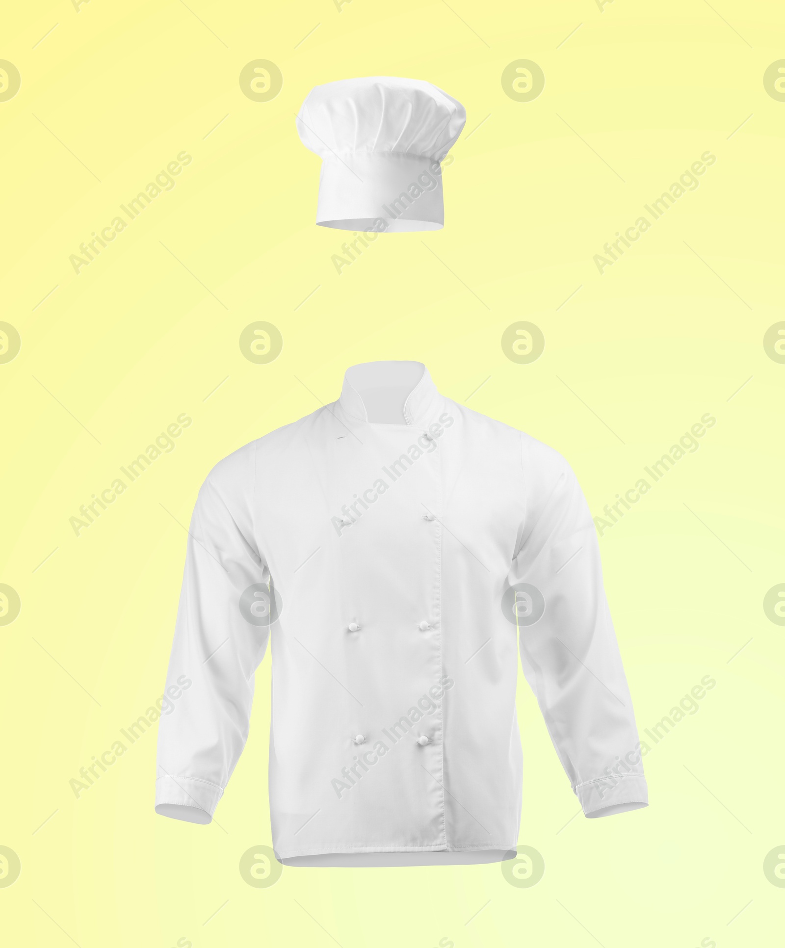 Chef's uniform in air against yellow gradient background. Toque and jacket Image of Chef's uniform in air against yellow gradient background. Toque and jacket