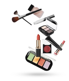 Image of Different makeup products in air against white background