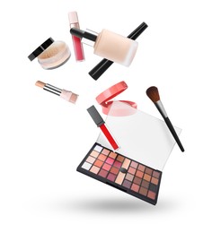 Image of Eyeshadow palette and other makeup products in air against white background