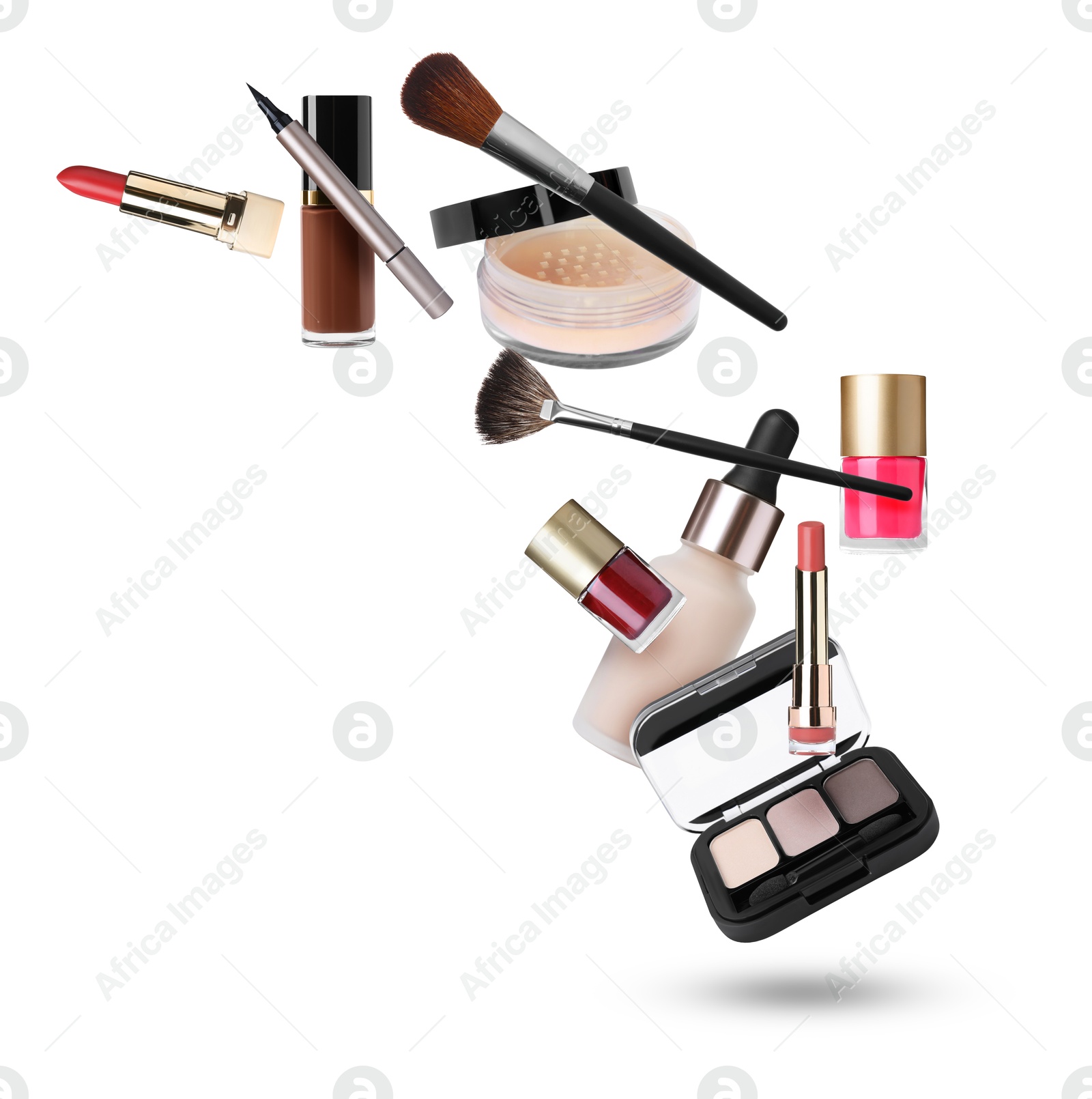 Image of Different makeup products in air against white background