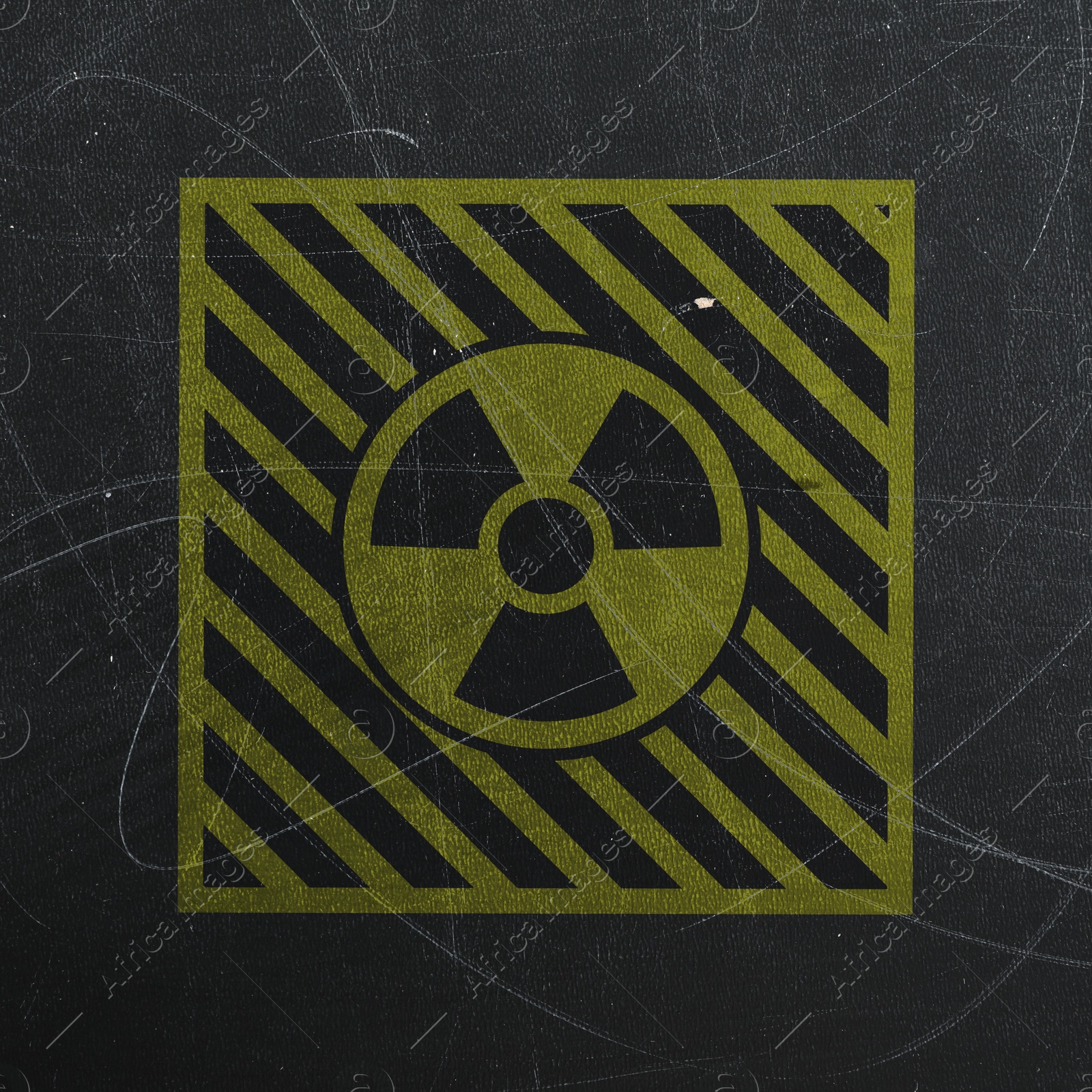 Image of Yellow radioactive sign on scratched black background. Radiological pollution