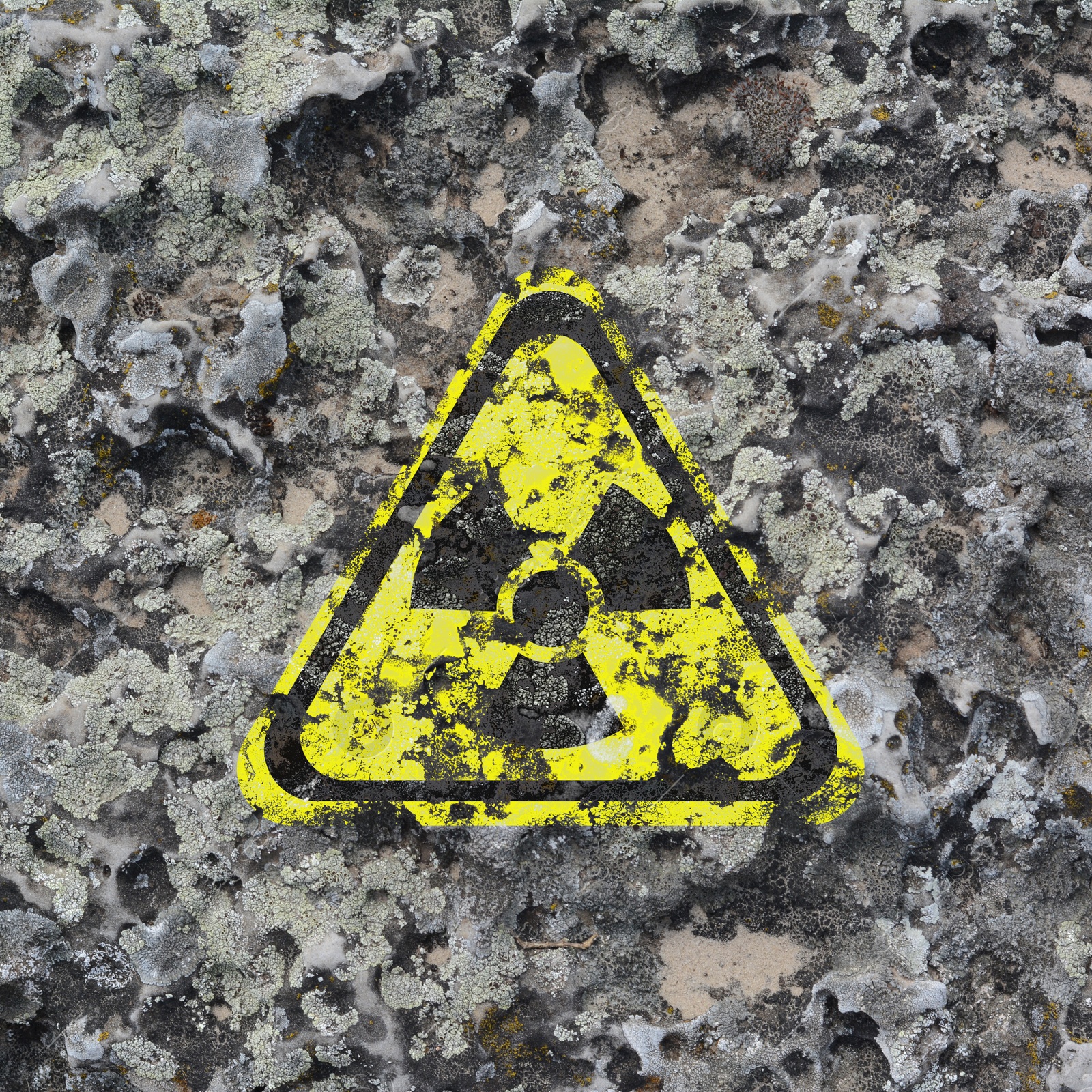 Image of Yellow radioactive sign on textured background. Radiological pollution
