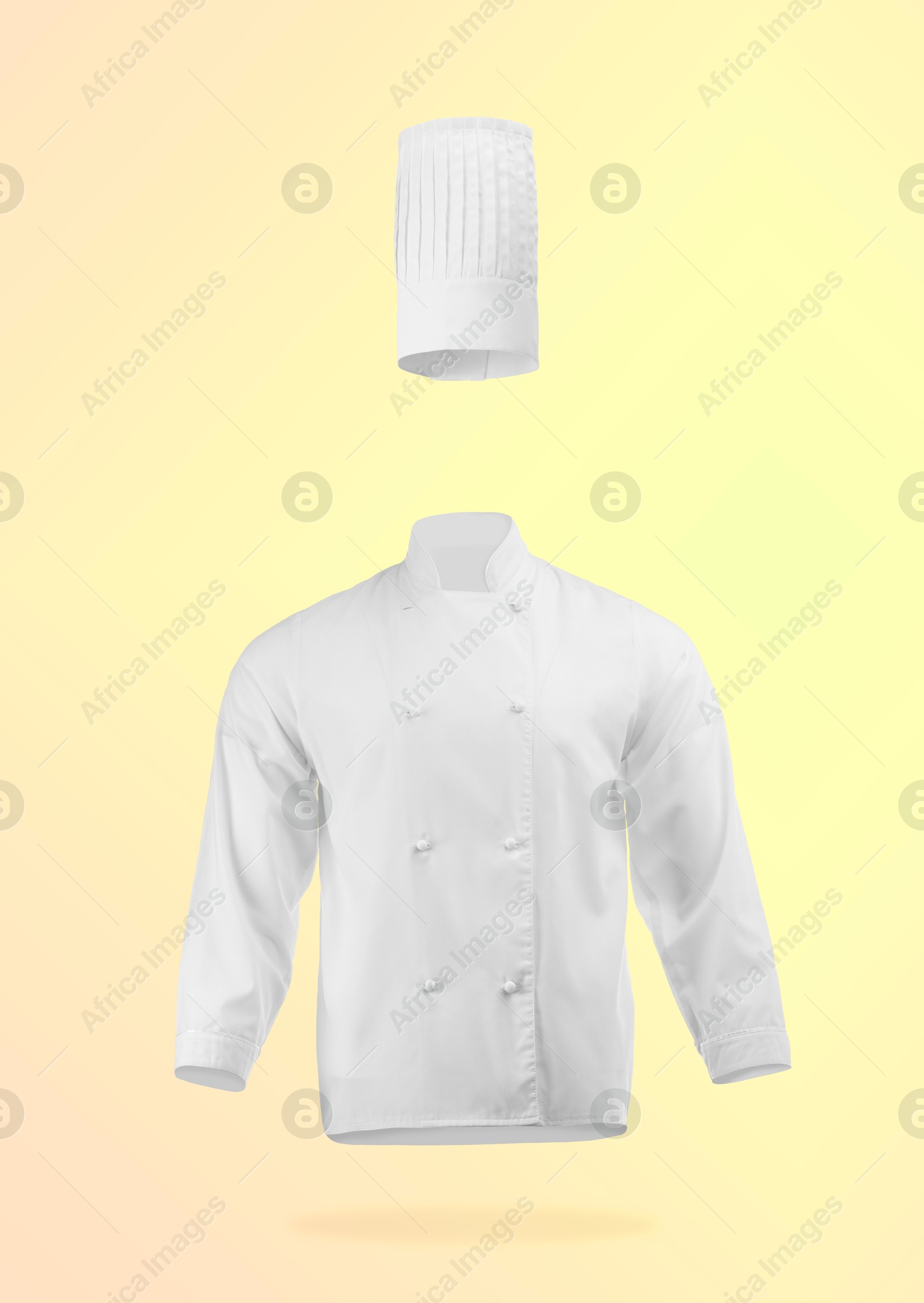 Chef's uniform in air against yellow gradient background. Toque and jacket Image of Chef's uniform in air against yellow gradient background. Toque and jacket