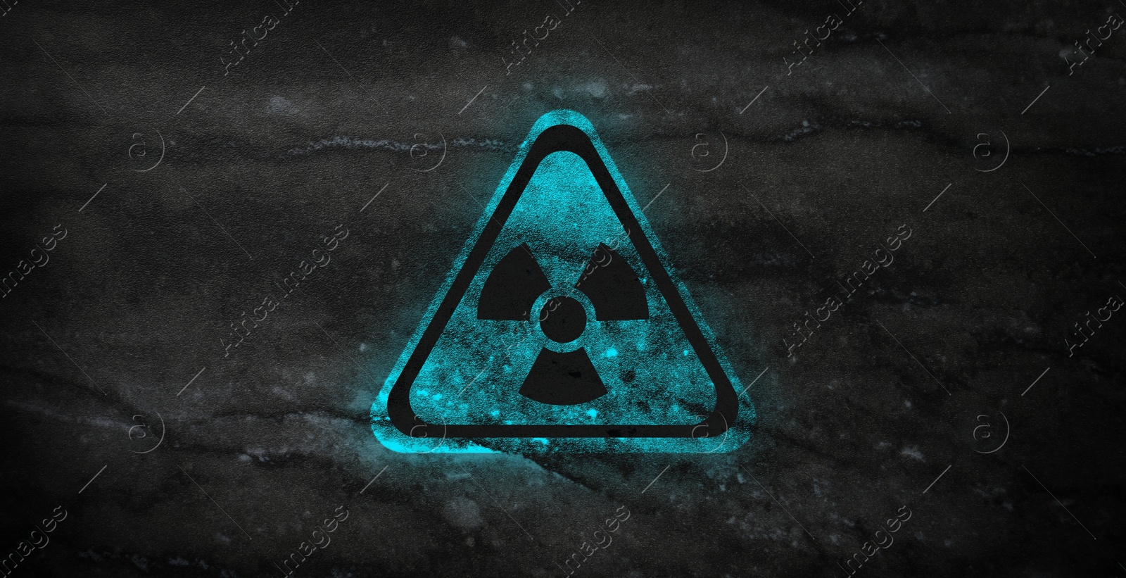 Image of Cyan radioactive sign on black marble background, banner design. Radiological pollution